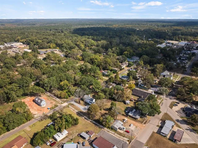 an aerial view of residential building with parking space
