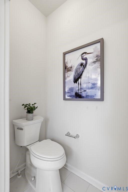 8712 Bailey Hill Road Midlothian, VA 23112 - Photo 26 of 46 a white toilet sitting next to a white walls and a shower