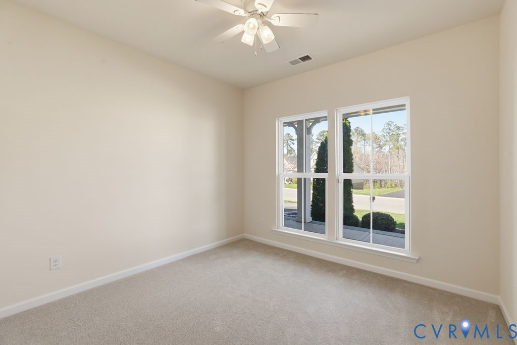 8712 Bailey Hill Road Midlothian, VA 23112 - Photo 27 of 46 an empty room with a window