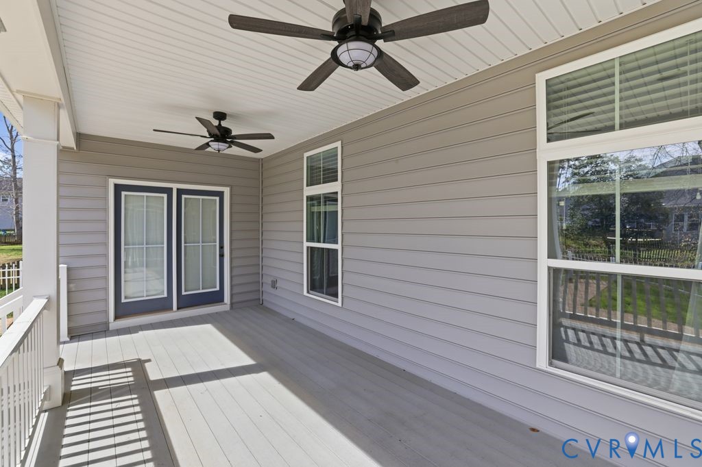8712 Bailey Hill Road Midlothian, VA 23112 - Photo 34 of 46 a view of a balcony with a ceiling fan