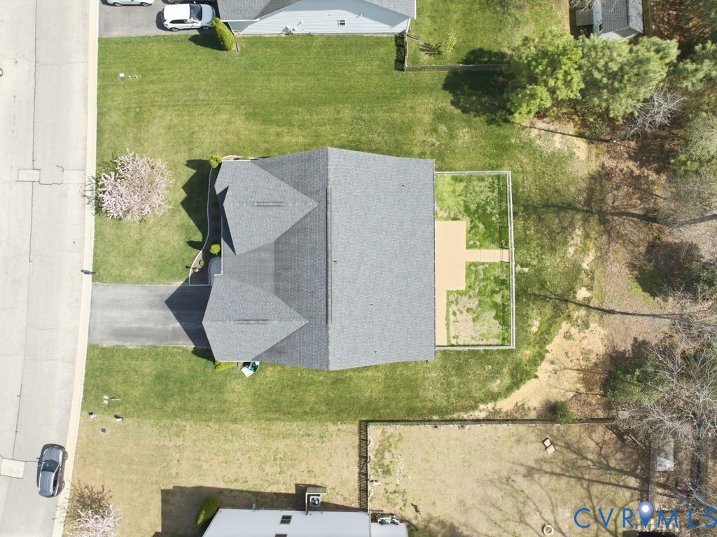 8712 Bailey Hill Road Midlothian, VA 23112 - Photo 41 of 46 a view of a swimming pool with a yard