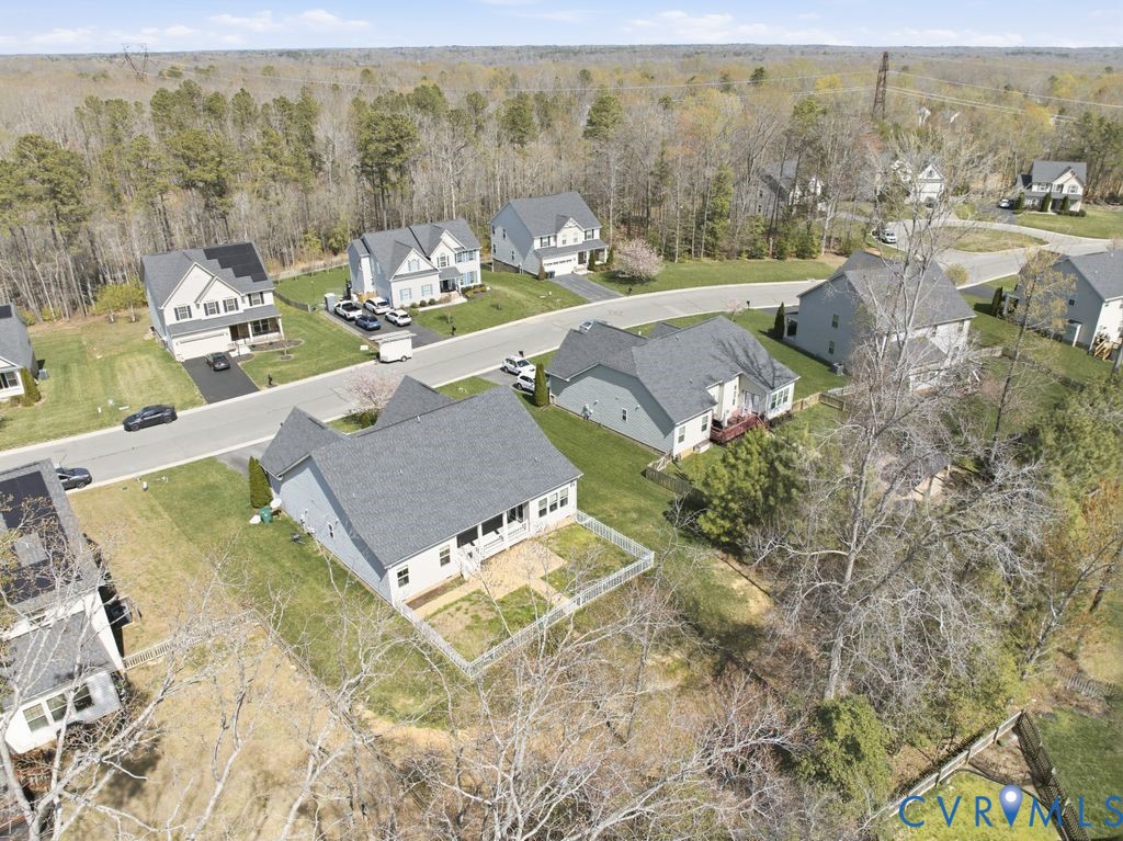 8712 Bailey Hill Road Midlothian, VA 23112 - Photo 46 of 46 an aerial view of a house with yard swimming pool and mountain view