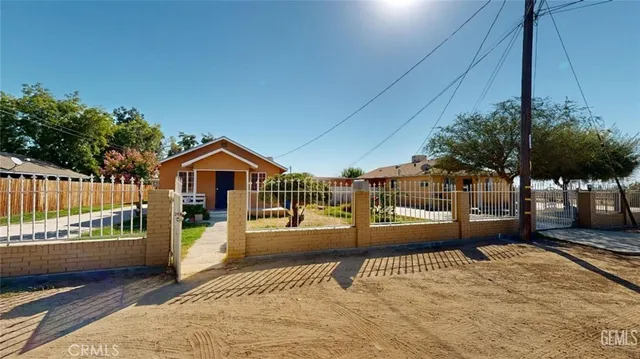 a view of a houses with a street