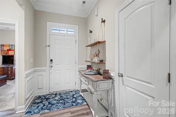 a bathroom with a sink a vanity and a shower