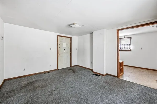 a room with furniture and a window
