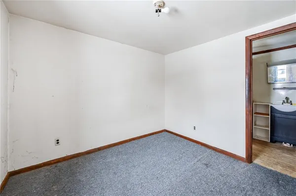 a view of a room with an empty space