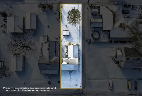 an ocean view with residential house and car parked
