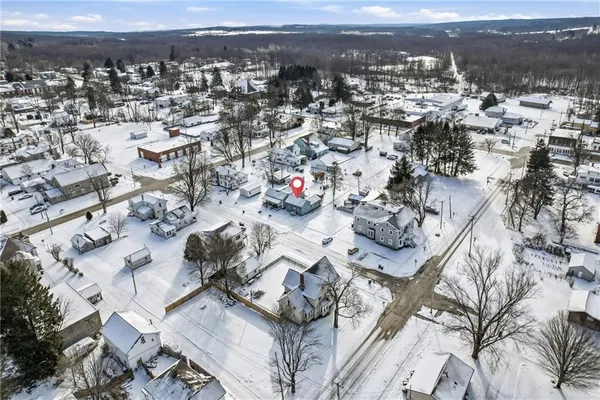 a view of an empty room with stairs