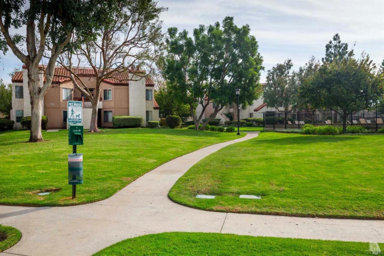 1706 Sinaloa Road, Unit 107 Simi Valley, CA 93065 - Photo 18 of 27 a view of a house with a backyard