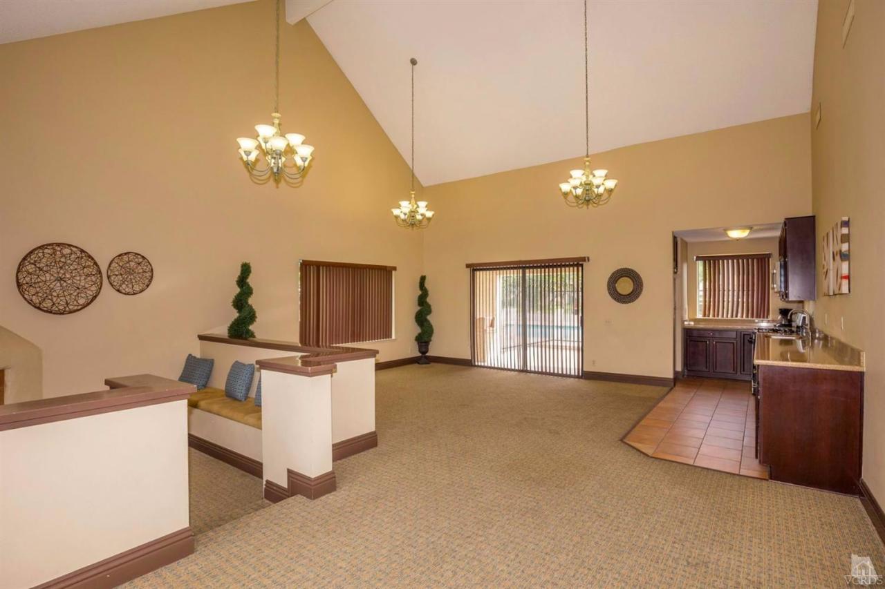 1706 Sinaloa Road, Unit 107 Simi Valley, CA 93065 - Photo 22 of 27 a view of a livingroom with furniture and a window