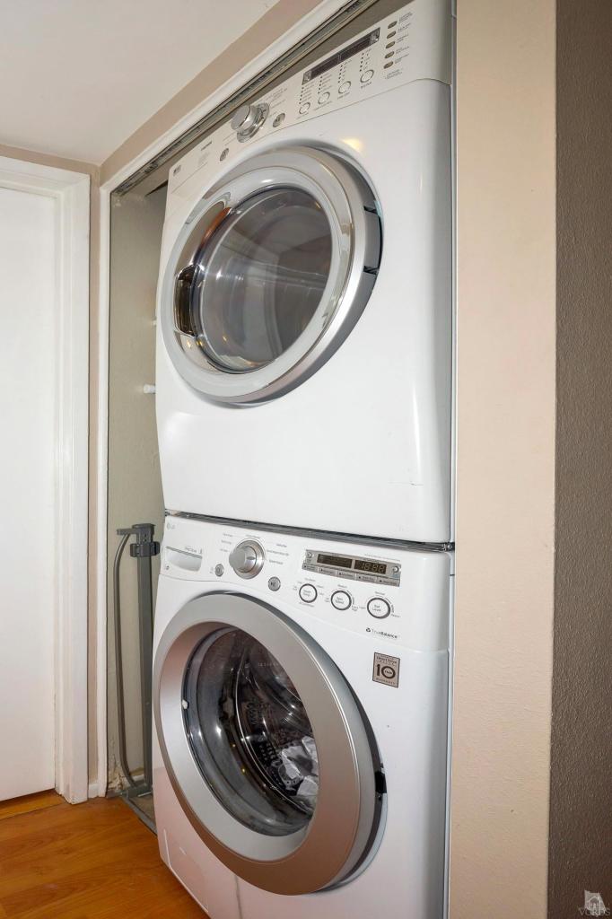 1706 Sinaloa Road, Unit 107 Simi Valley, CA 93065 - Photo 8 of 27 a utility room with dryer and washer