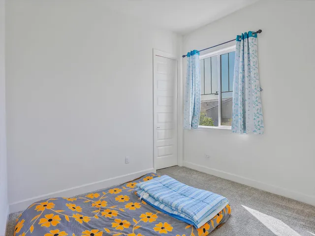 a view of an empty room and window