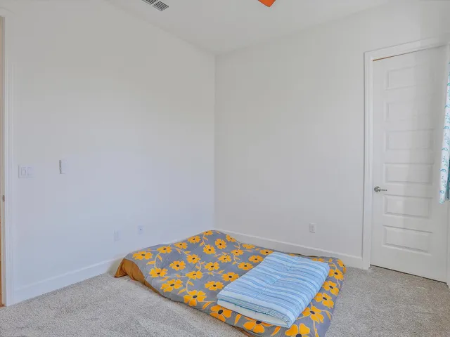 an empty room with a bench