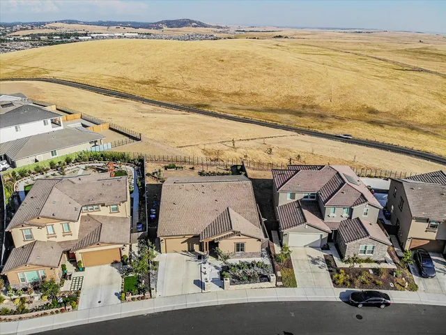 an aerial view of beach and ocean