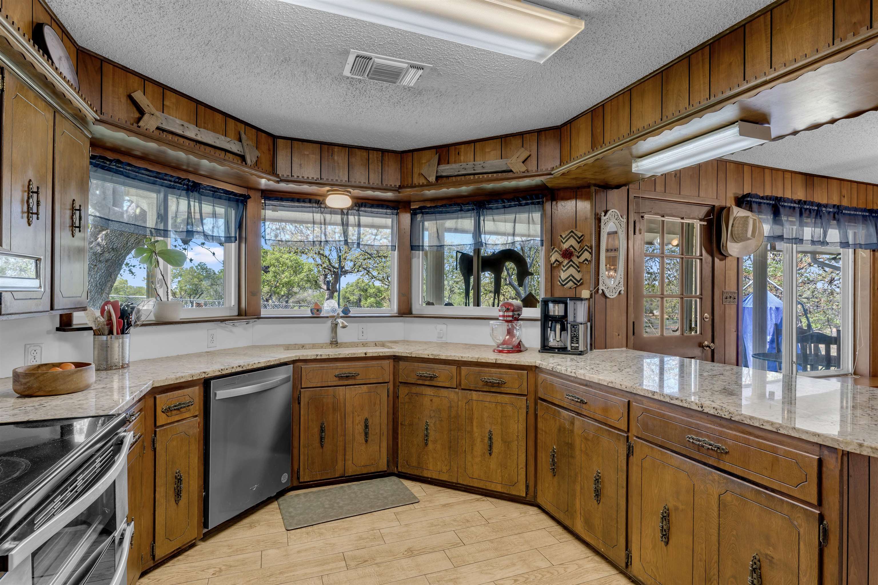 301 Wood Forest Road Kingsland, TX 78639 - Photo 11 of 32 a kitchen with lots of counter space and a sink