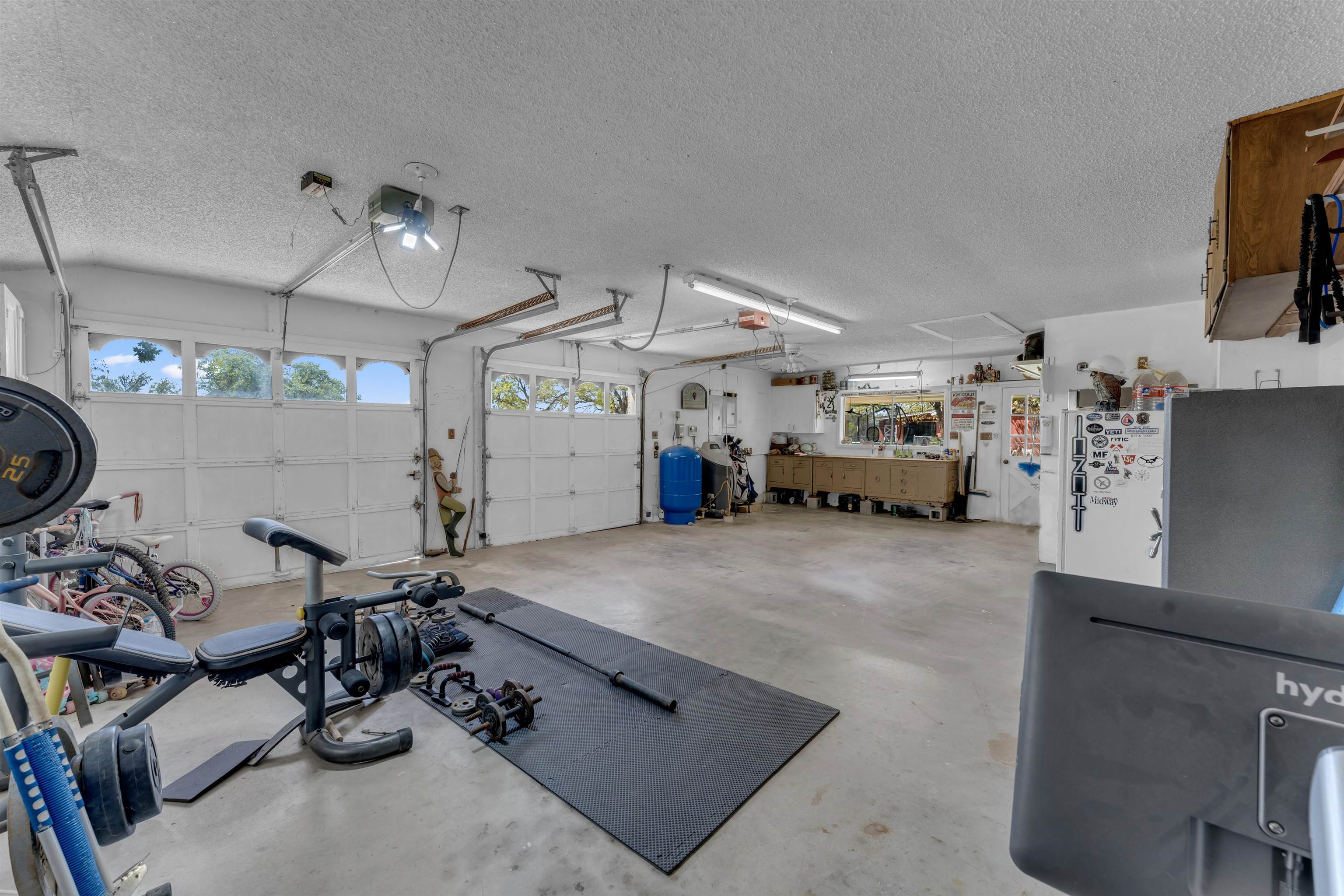 301 Wood Forest Road Kingsland, TX 78639 - Photo 20 of 32 a living room with furniture and a flat screen tv