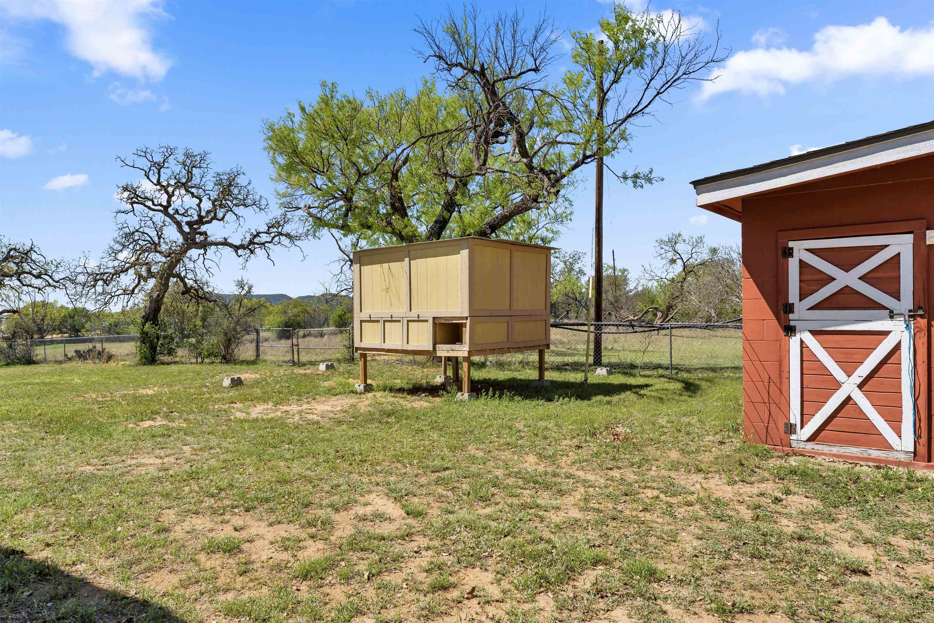 301 Wood Forest Road Kingsland, TX 78639 - Photo 27 of 32 a view of backyard with wooden fence