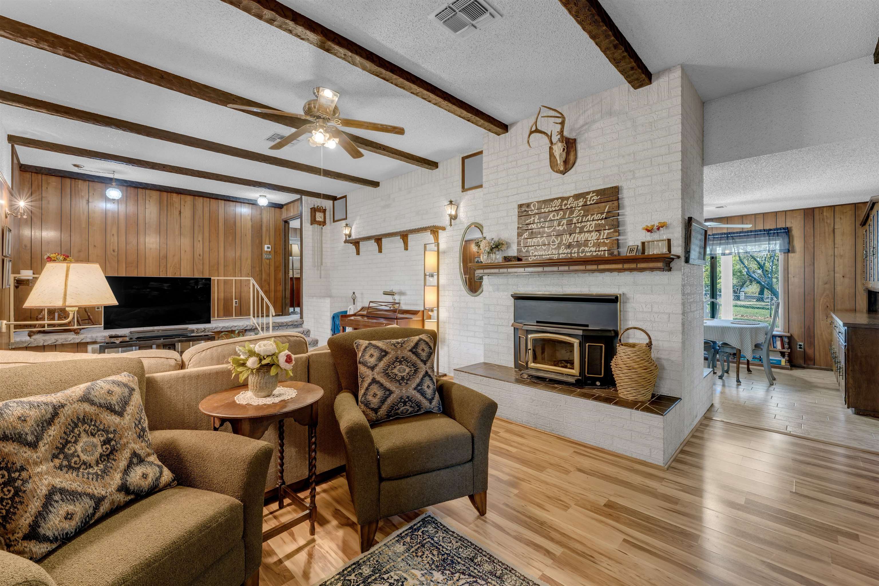 301 Wood Forest Road Kingsland, TX 78639 - Photo 6 of 32 a living room with furniture and a fireplace