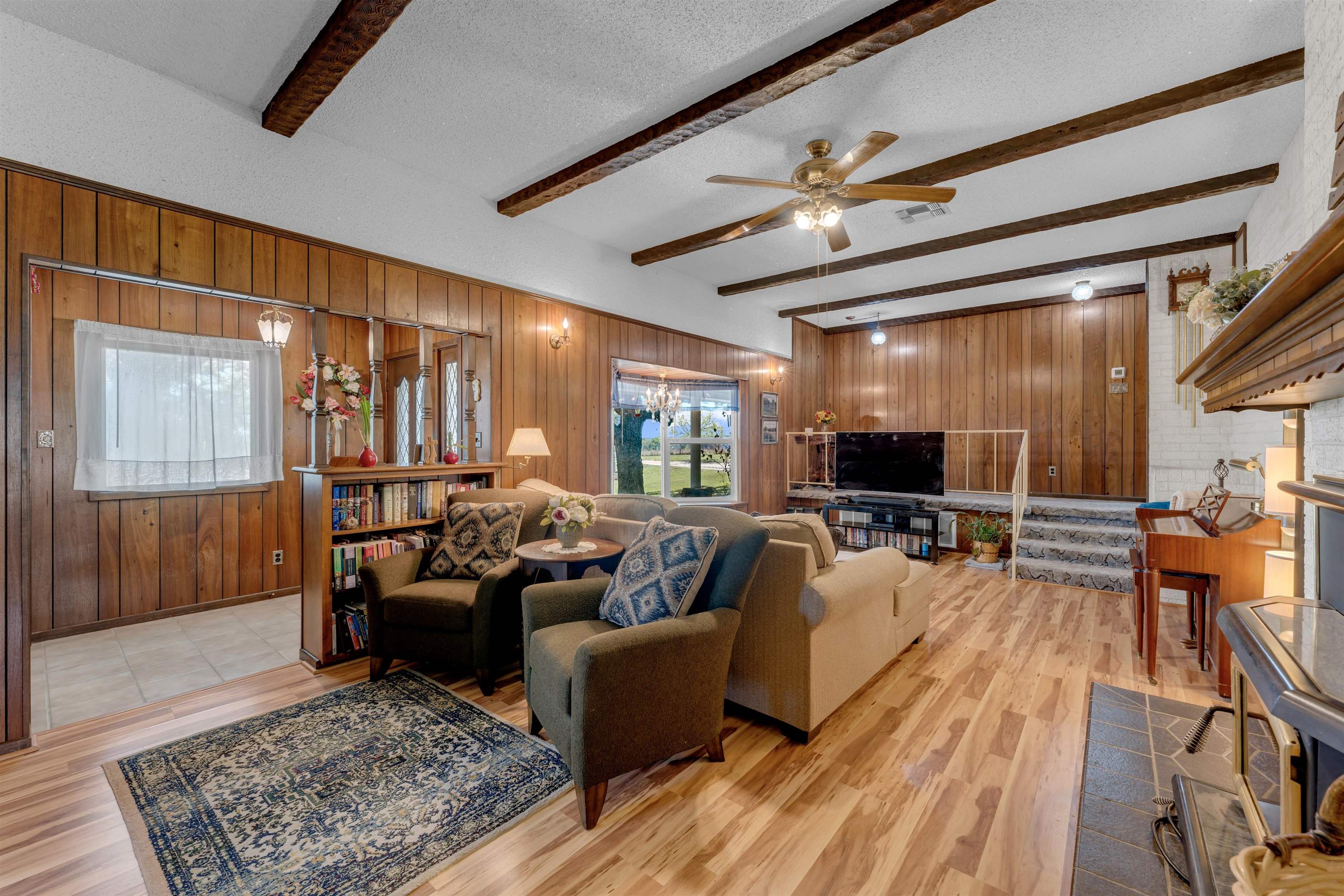 301 Wood Forest Road Kingsland, TX 78639 - Photo 8 of 32 a living room with furniture and a flat screen tv