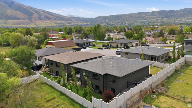 653 East Vandalay Lane Draper, UT 84020 - Photo 54 of 61 Modern residential development featuring multiple properties with dark siding and light-colored fencing