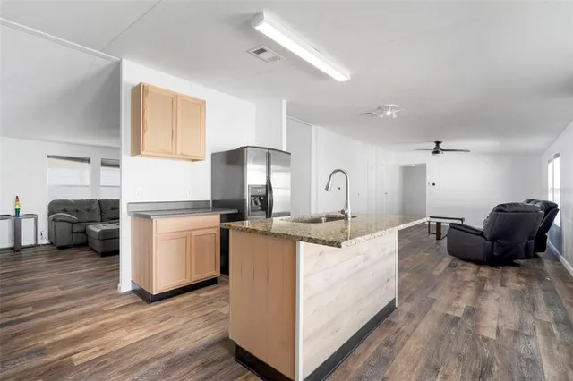 a living room with furniture and a table