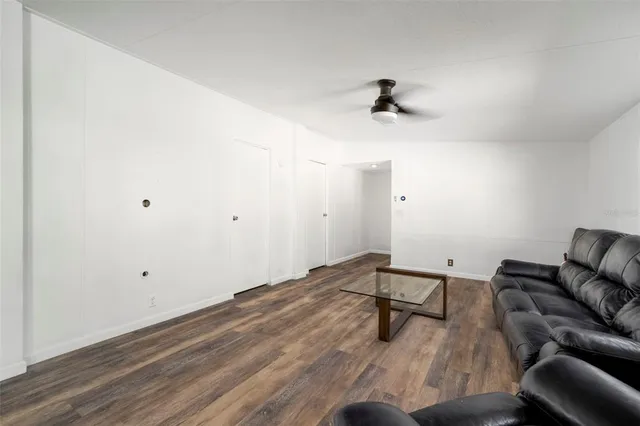 a view of workspace with hardwood floor