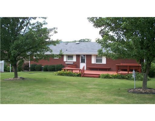 202 Warren Street Perryopolis, PA 15473 - Photo 2 of 18 Exterior Back. Large patio with built-in benches is the perfect place for those outdoor picnics!