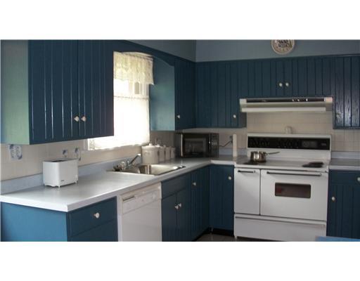 202 Warren Street Perryopolis, PA 15473 - Photo 11 of 18 Kitchen. Large eat in country kitchen opens up to huge deck overlooking level backyard!