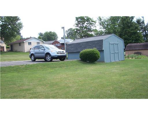 202 Warren Street Perryopolis, PA 15473 - Photo 4 of 18 Storage. Spacious storage shed and additional parking space are added bonuses!