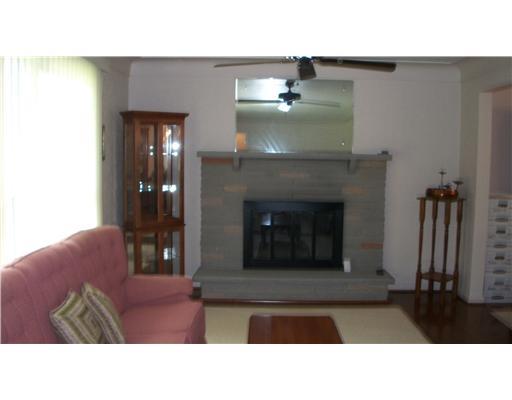 202 Warren Street Perryopolis, PA 15473 - Photo 6 of 18 Living Room. Beautiful stone fireplace is the focal point of this very spacious living room!