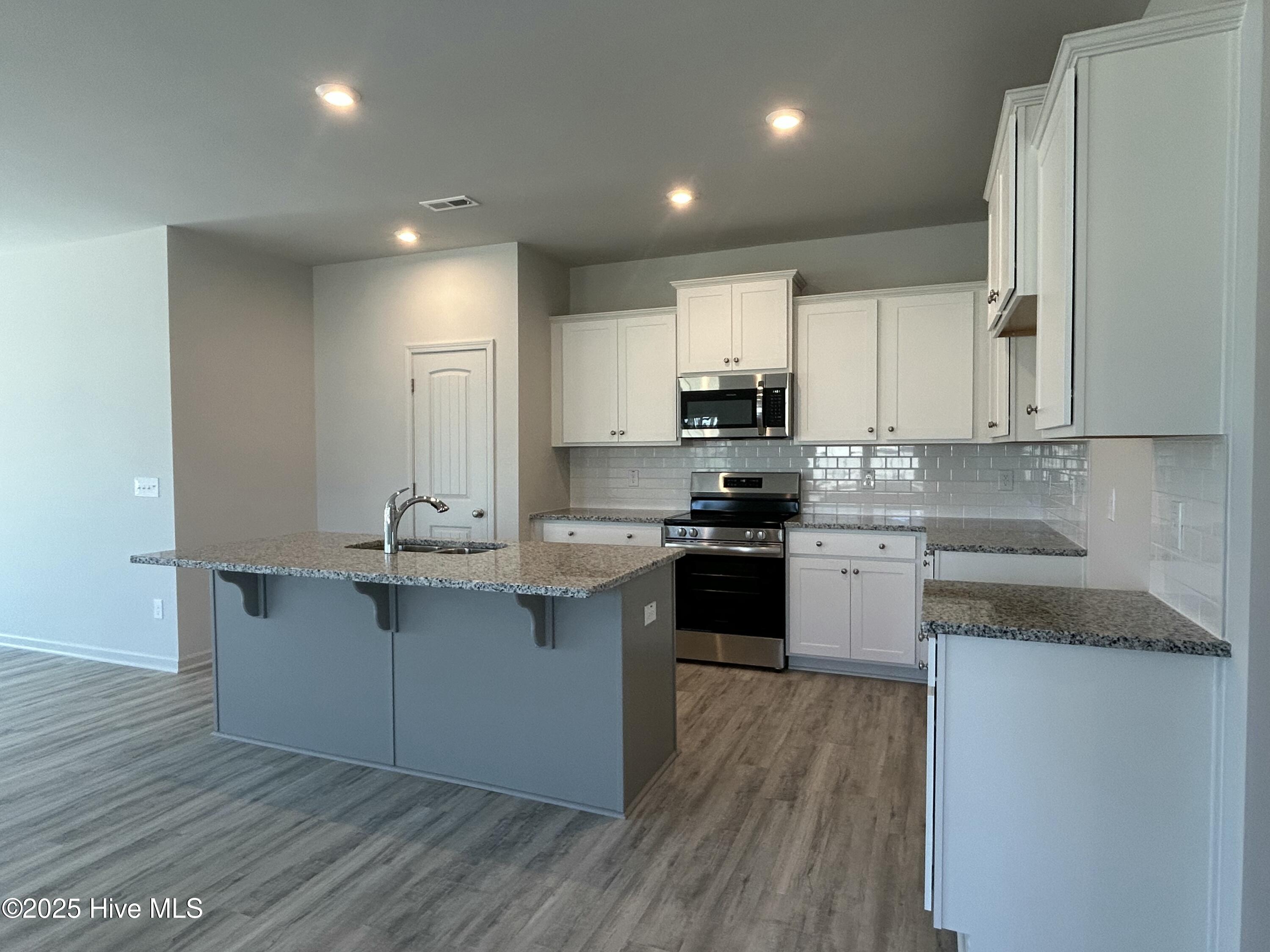 102 Johnson Rdg Way Four Oaks, NC 27524 - Photo 16 of 32 HS 34 Brunswick 1_45 Kitchen
