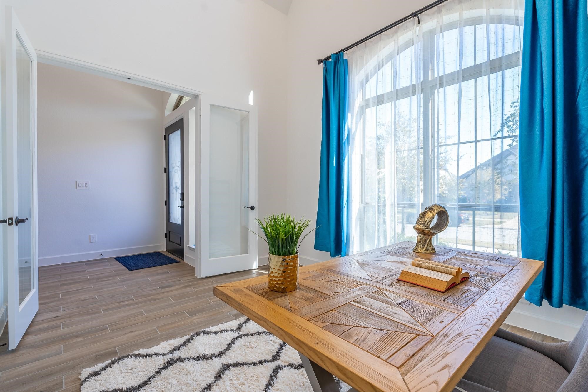 4118 Ana Ridge Lane Fulshear, TX 77441 - Photo 11 of 49 a living room with a bed furniture and next to a window