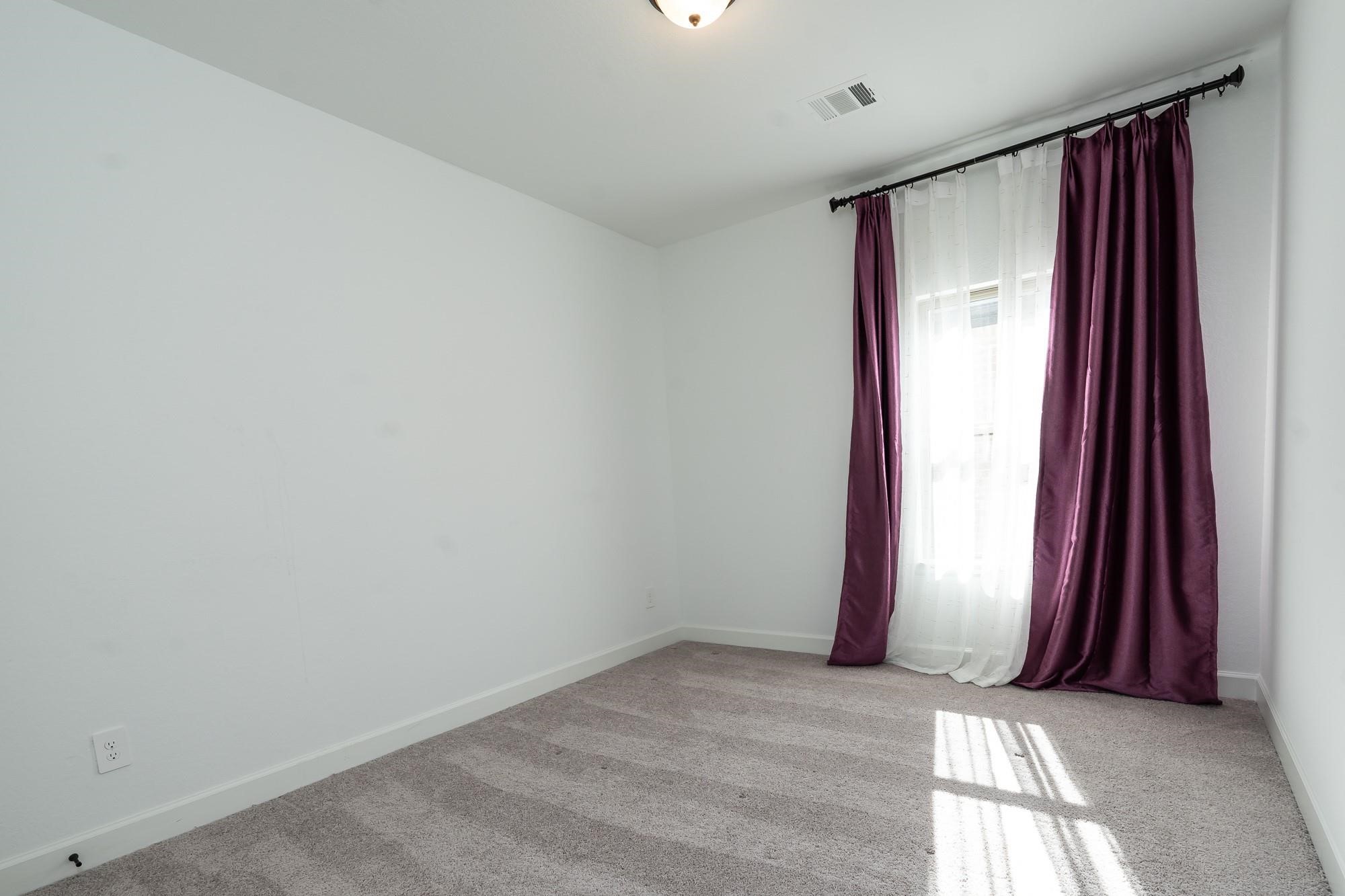 4118 Ana Ridge Lane Fulshear, TX 77441 - Photo 34 of 49 a view of a room with windows and closet