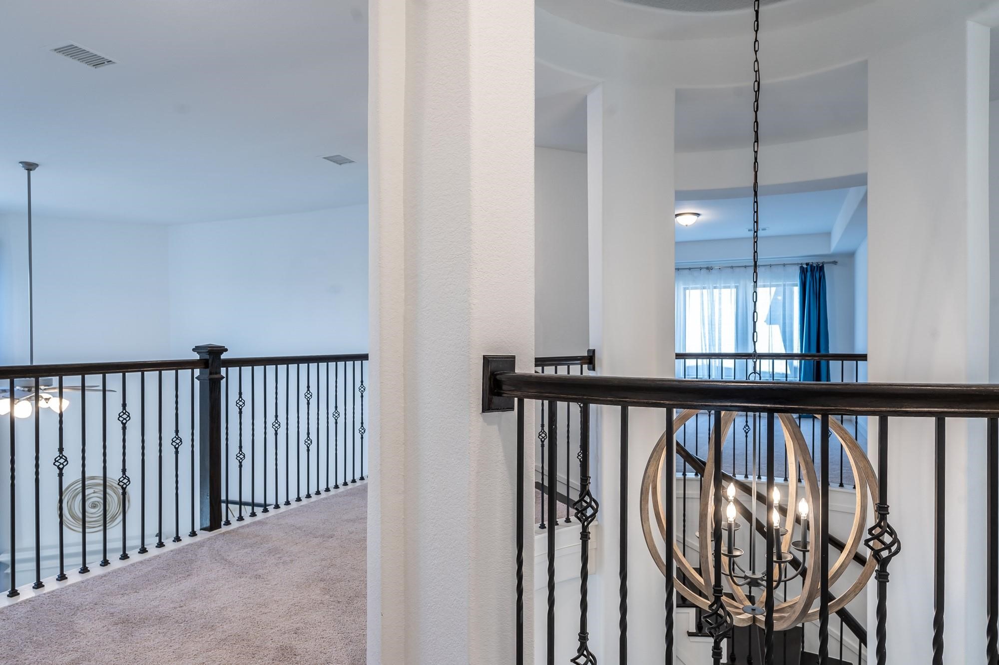 4118 Ana Ridge Lane Fulshear, TX 77441 - Photo 39 of 49 a view of a balcony with staircase