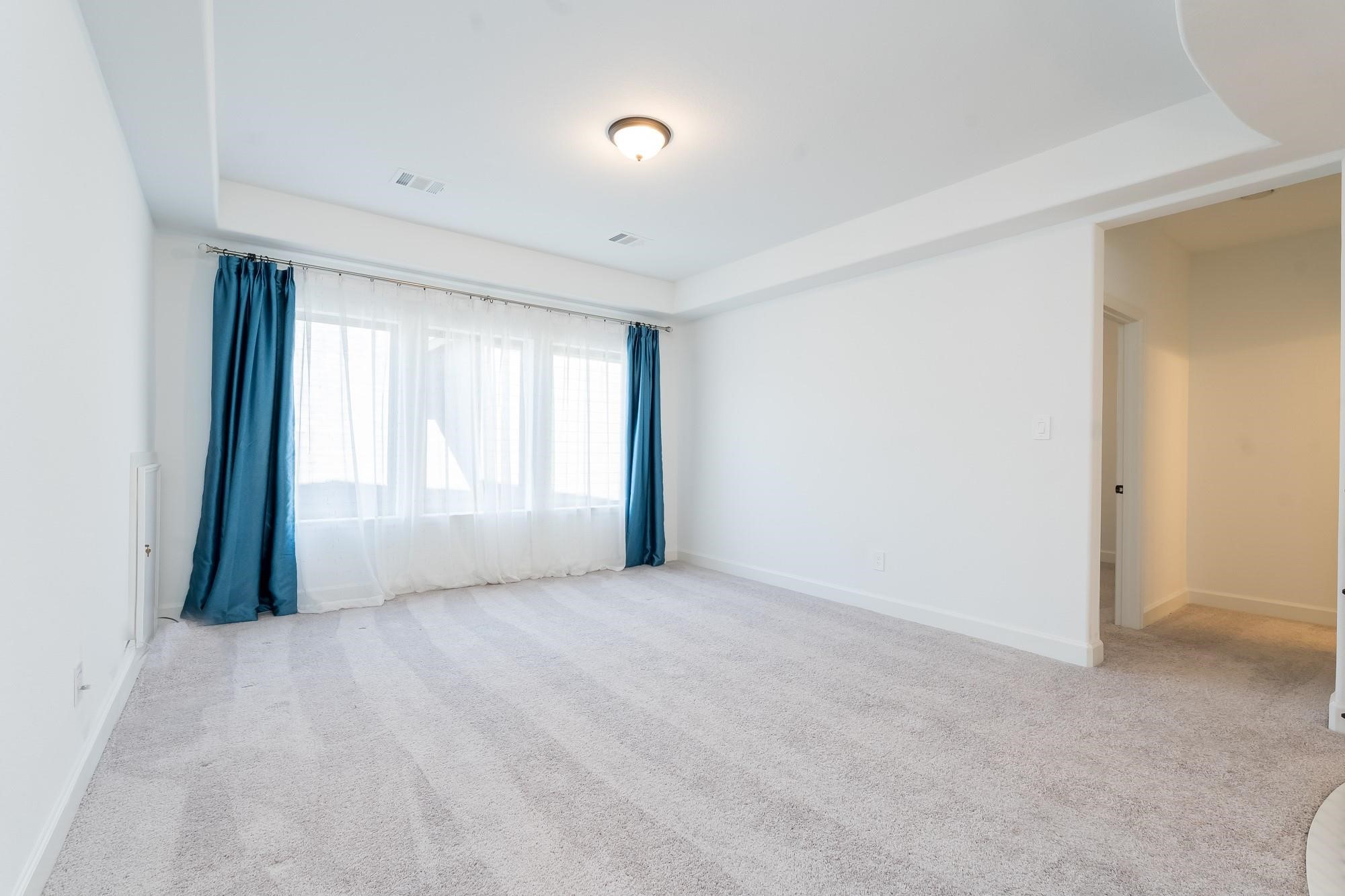 4118 Ana Ridge Lane Fulshear, TX 77441 - Photo 42 of 49 a view of an empty room with a window