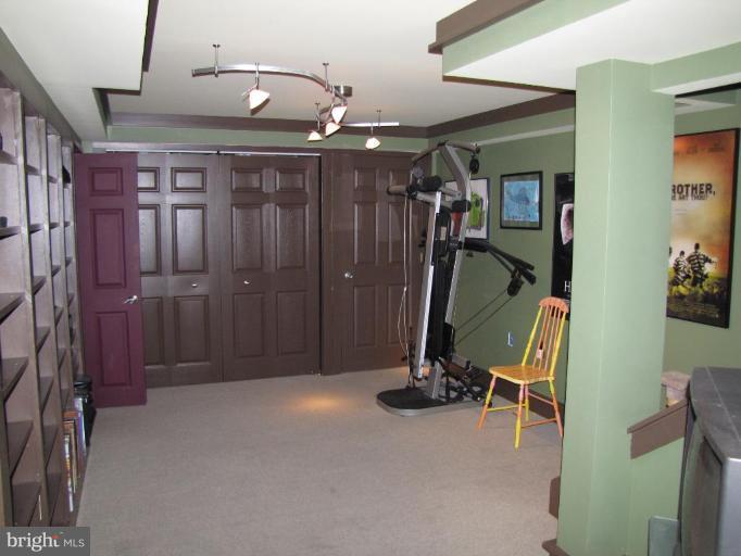 6286 Patuxent Quarter Road Hanover, MD 21076 - Photo 22 of 30 a view of a room with gym equipment