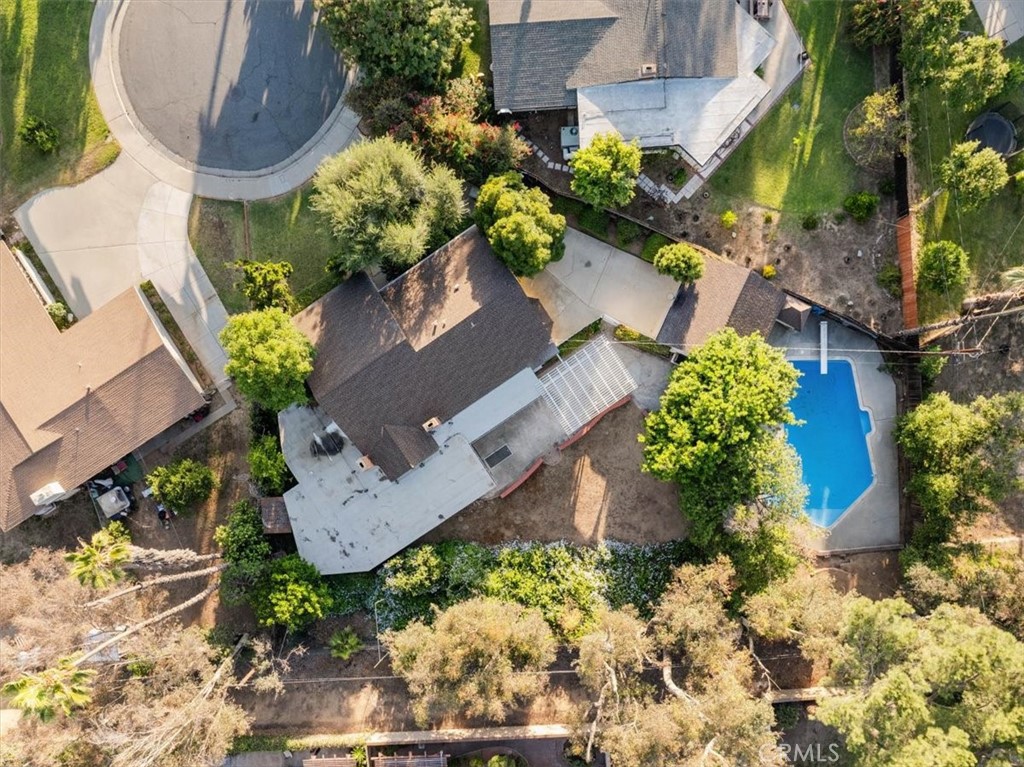 2807 Wyoming Way Riverside, CA 92506 - Photo 35 of 40 an aerial view of a house with a yard and garden