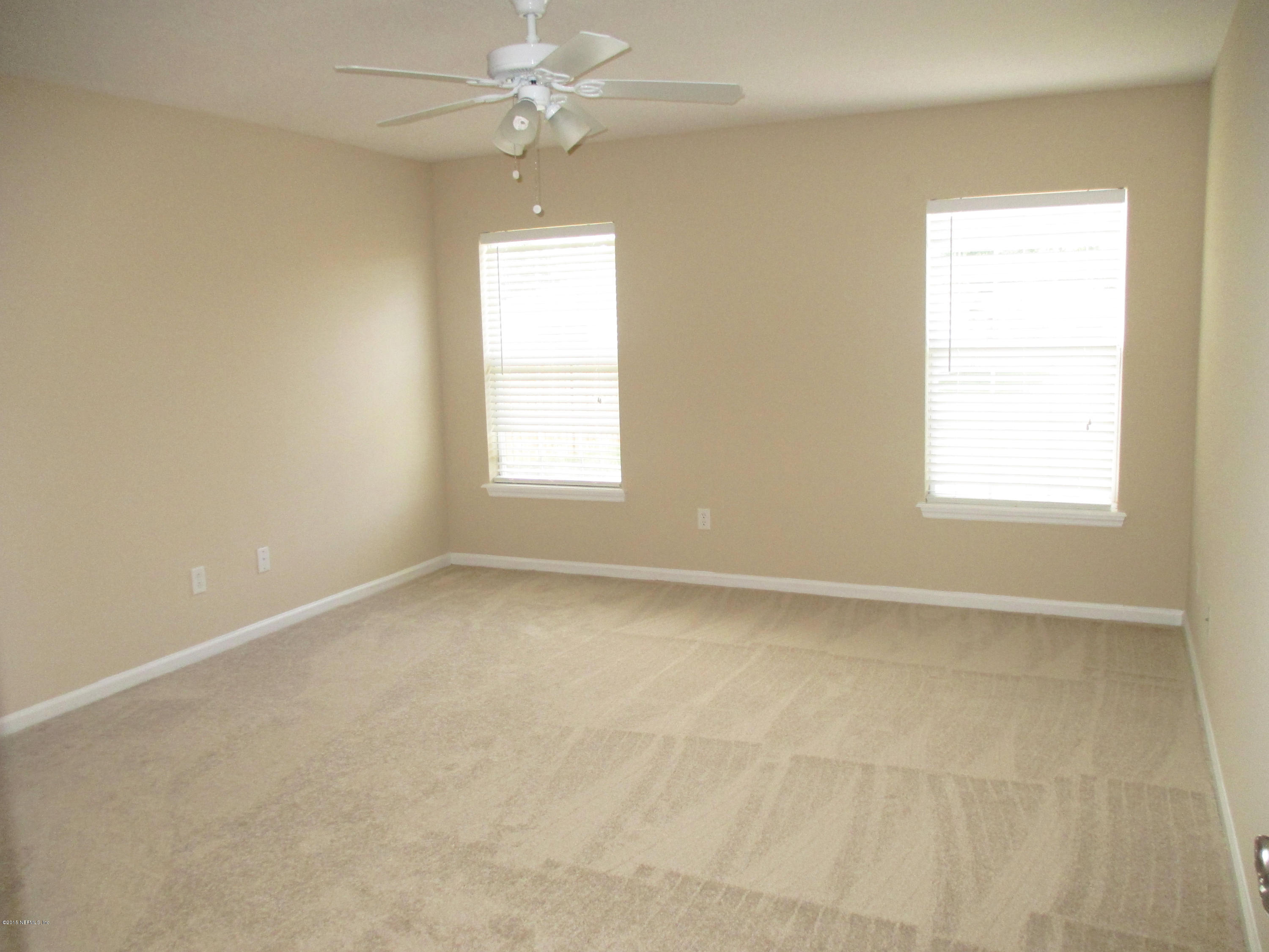 76151 Long Pond Loop Yulee, FL 32097 - Photo 14 of 19 Master Bedroom