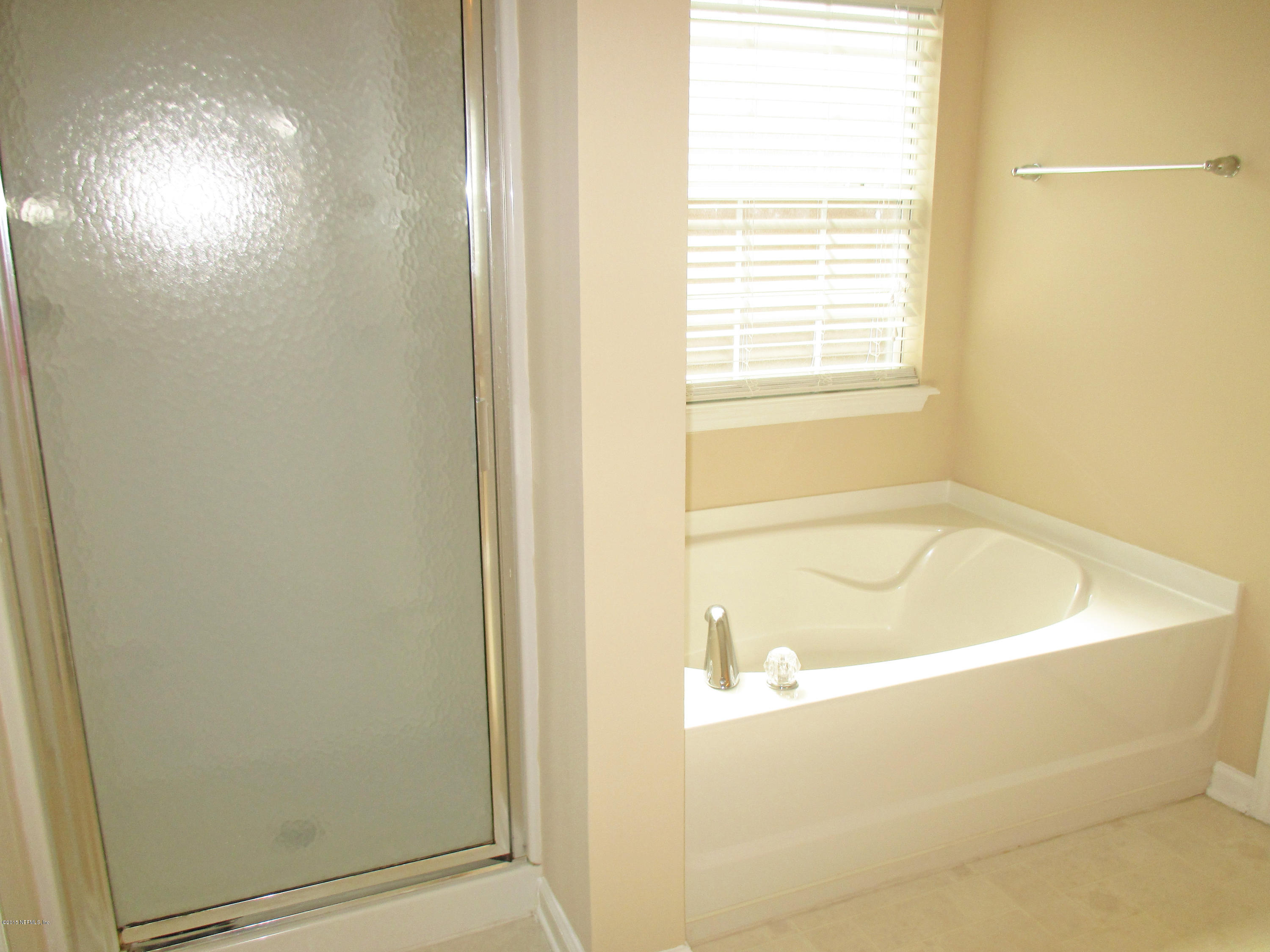 76151 Long Pond Loop Yulee, FL 32097 - Photo 16 of 19 Master Tub and Shower