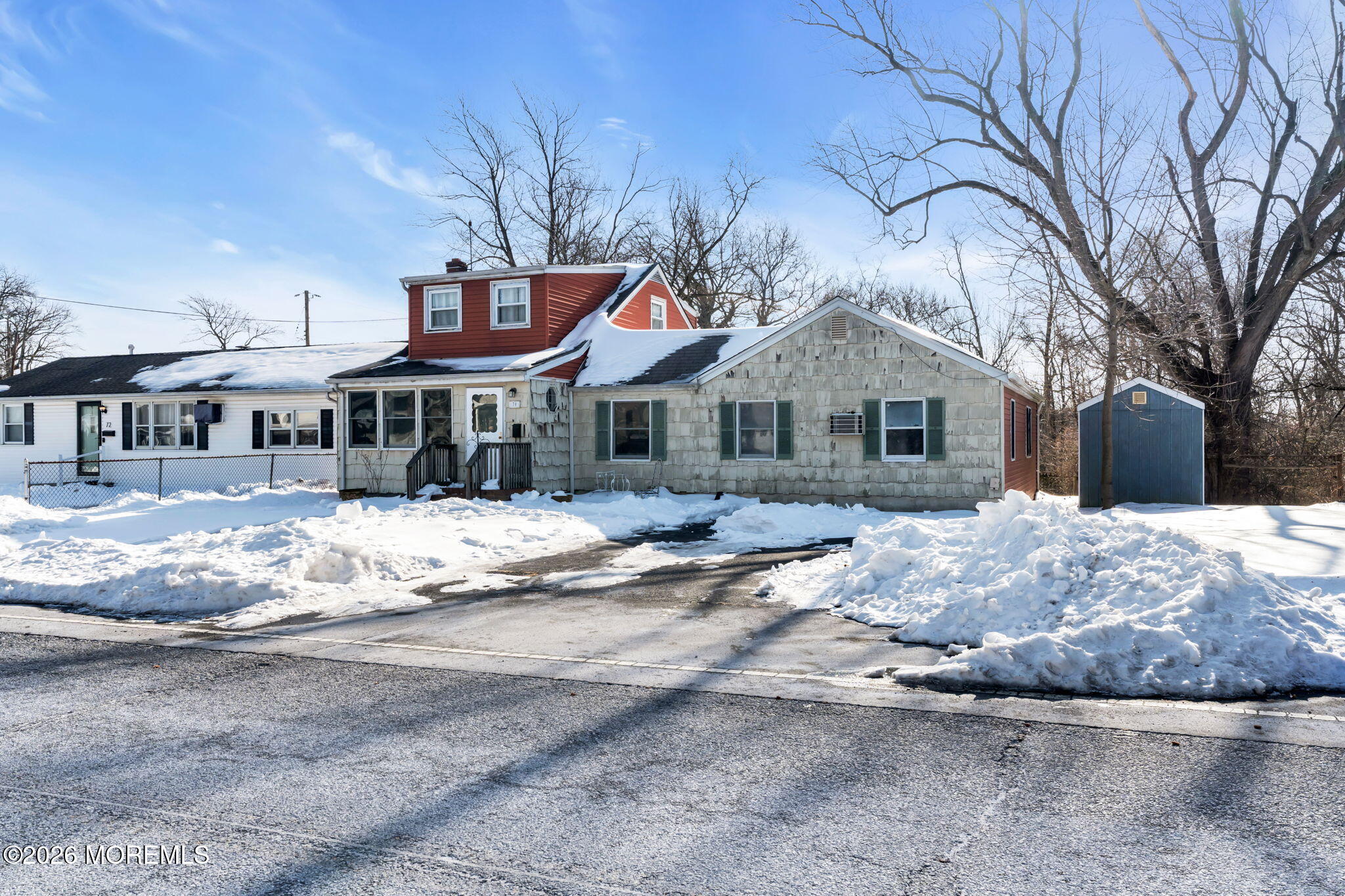 70 Ocean Boulevard Keyport, NJ 07735 - Photo 15 of 20 a front view of a house with a snow