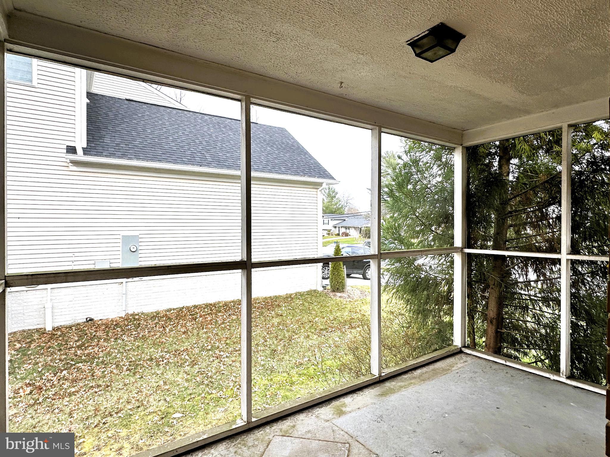 426 Old Courthouse Road Northeast Vienna, VA 22180 - Photo 20 of 56 Screened Porch off Living Room/Dining Room