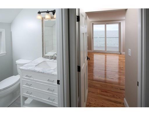 324 Ocean Street Marshfield, MA 02050 - Photo 17 of 25 a bathroom with a granite countertop sink and a mirror