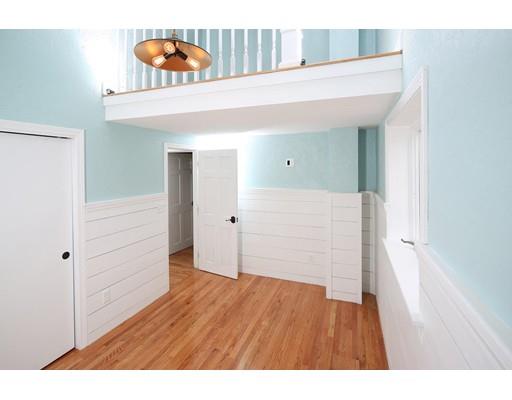 324 Ocean Street Marshfield, MA 02050 - Photo 19 of 25 a view of an empty room with wooden floor