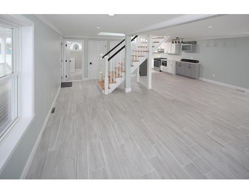 324 Ocean Street Marshfield, MA 02050 - Photo 8 of 25 a view of a living room with wooden floor