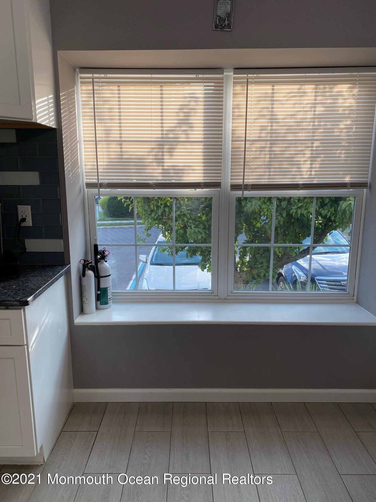 60 County Road, Unit D023 Cliffwood, NJ 07721 - Photo 15 of 36 a view of a room that has a bed and a window