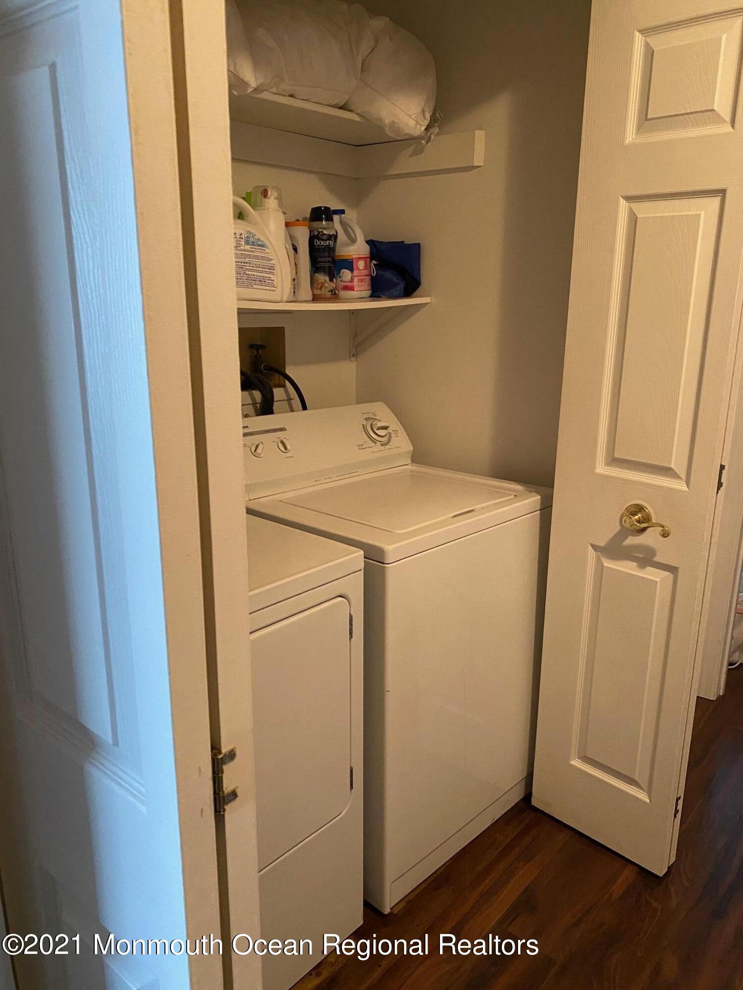 60 County Road, Unit D023 Cliffwood, NJ 07721 - Photo 27 of 36 a utility room with dryer and washer