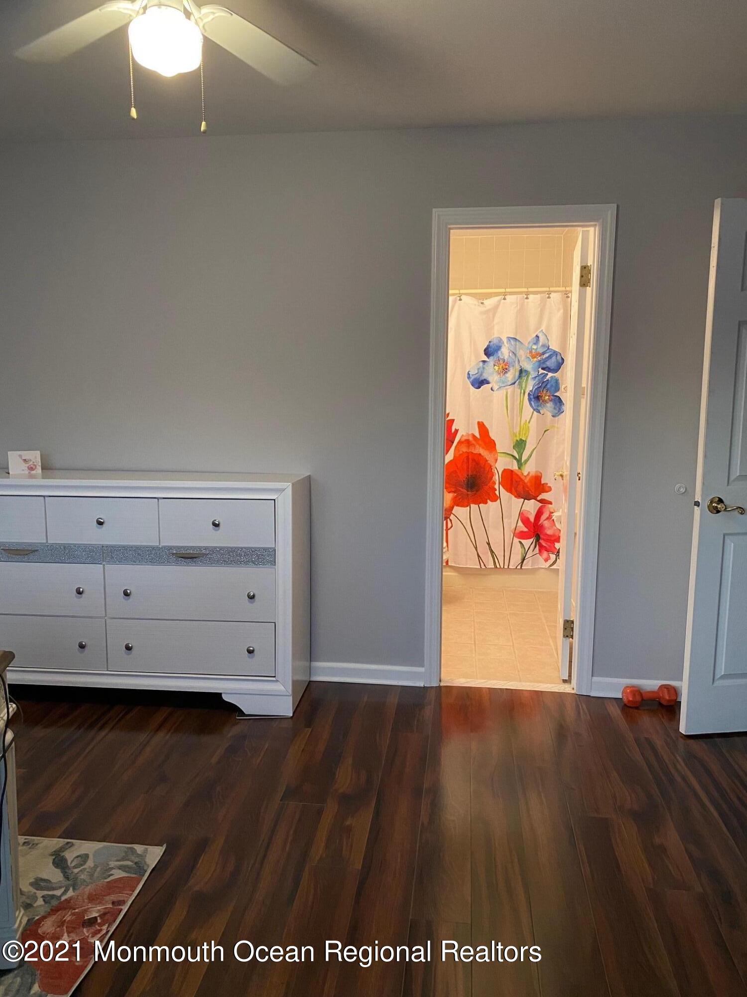 60 County Road, Unit D023 Cliffwood, NJ 07721 - Photo 29 of 36 a view of an entryway with wooden floor