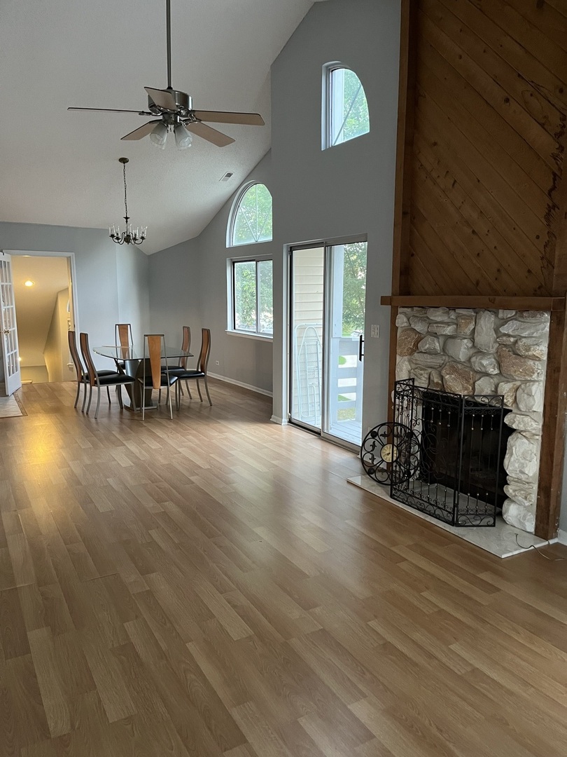 1272 Ranchview Court, Unit 1272 Buffalo Grove, IL 60089 - Photo 3 of 13 a view of a livingroom with furniture and a fireplace