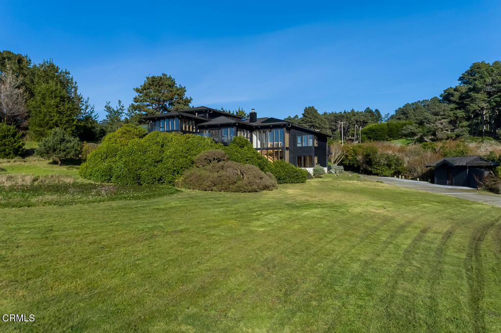 45460 Indian Shoals Road Mendocino, CA 95460 - Photo 28 of 50 a backyard of a house with lots of green space