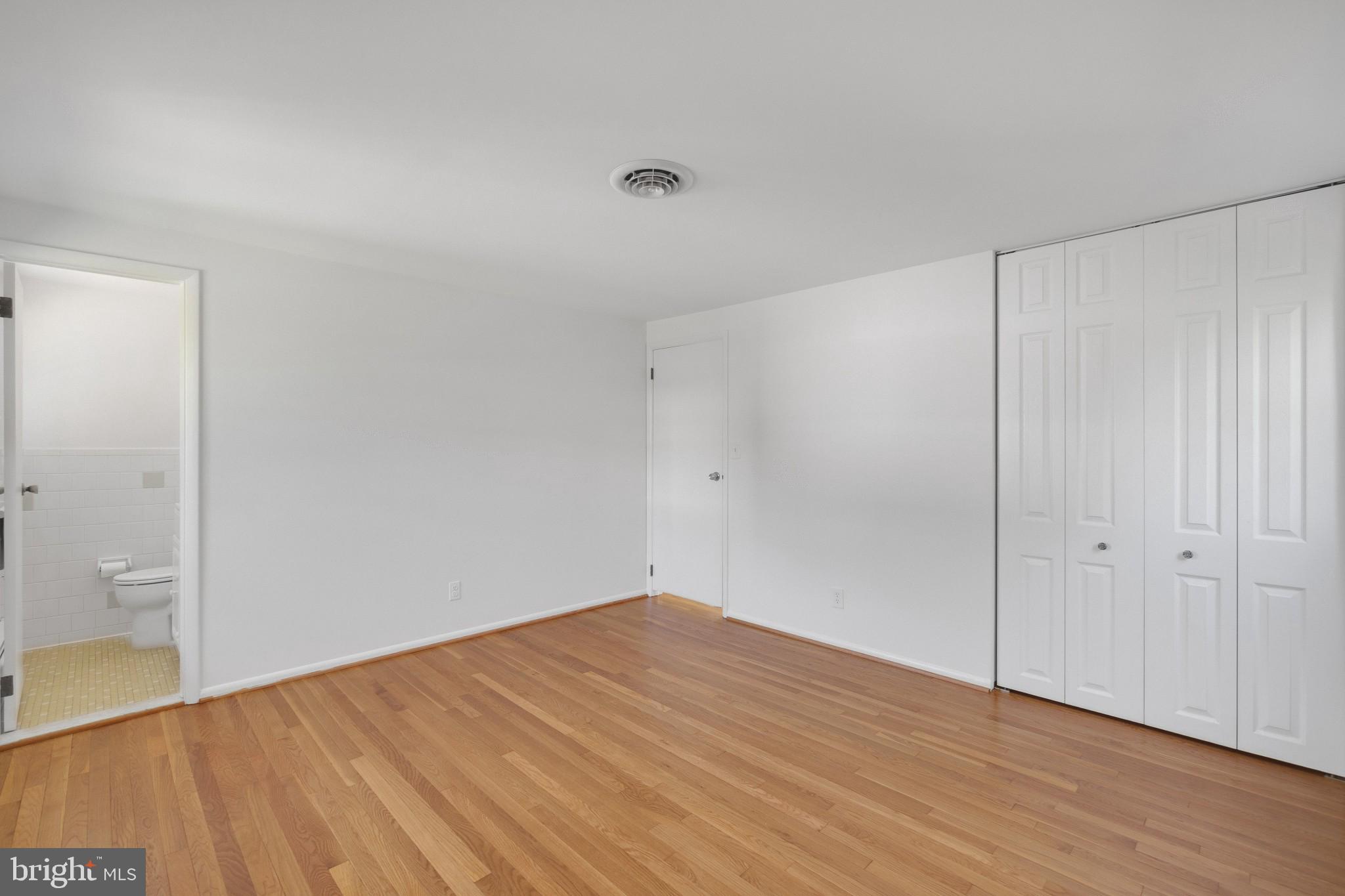 423 Bathurst Road Baltimore, MD 21228 - Photo 14 of 30 Master bedroom with refinished hardwood flooring